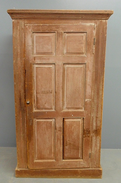 Appraisal: - Pennsylvania German pine storage cabinet c with a molded