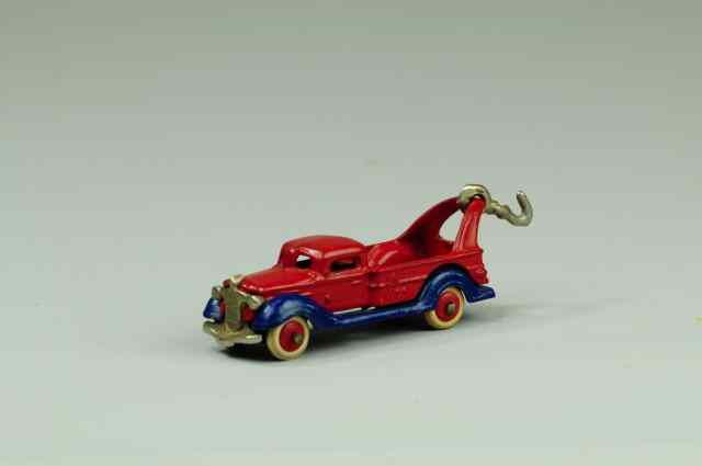 Appraisal: WRECKER Champion c cast iron red body with blue chassis