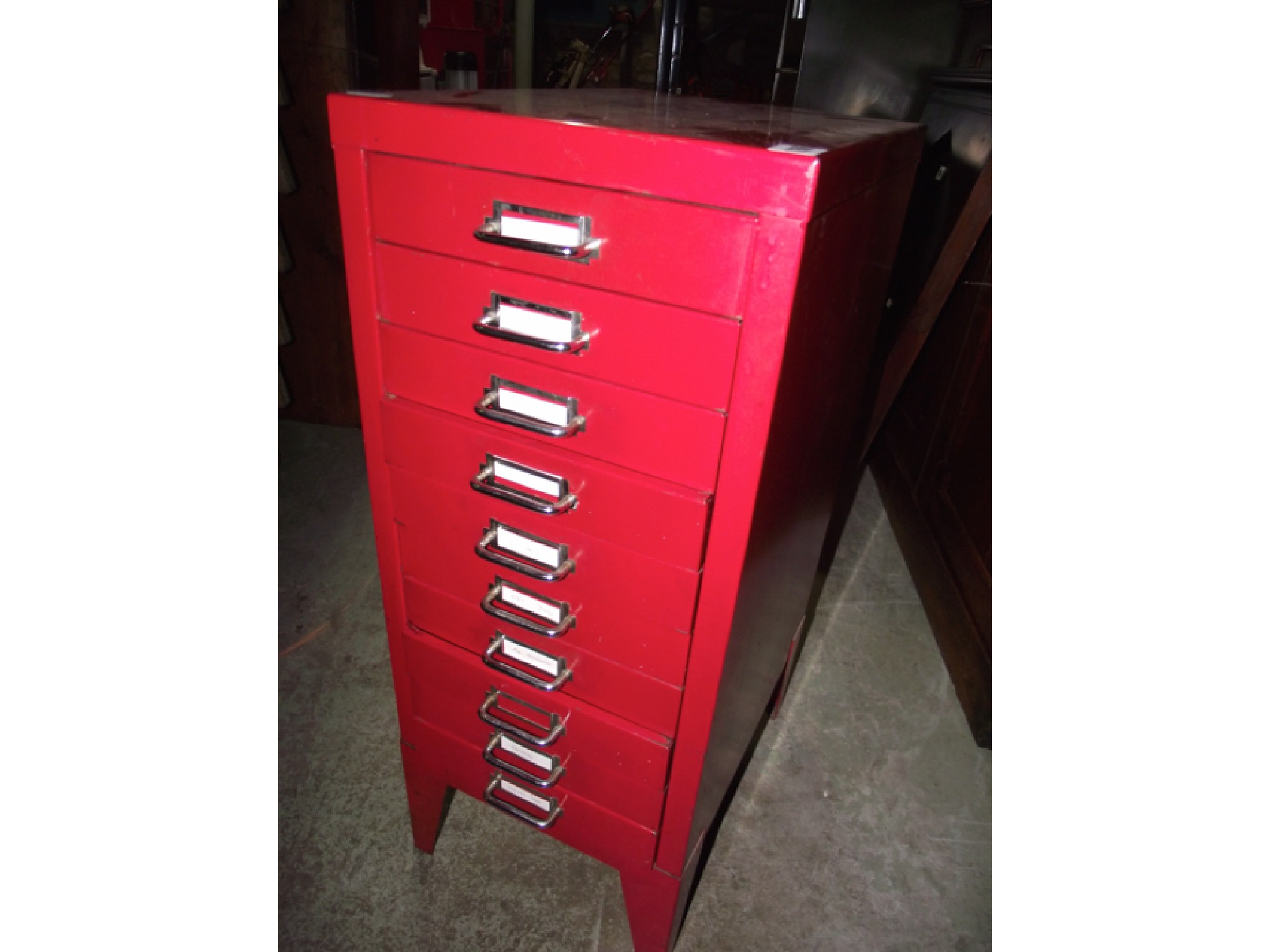 Appraisal: A filing cabinet for paper with ten drawers with bright