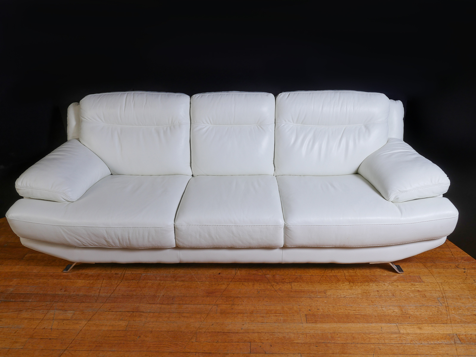 Appraisal: SOFIA VERGARA CASTILLA WHITE LEATHER SOFA Castilla Leather Sofa from