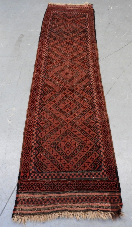 Appraisal: BALUCH RUG RUNNER Middle East th CenturyBlack brown and red