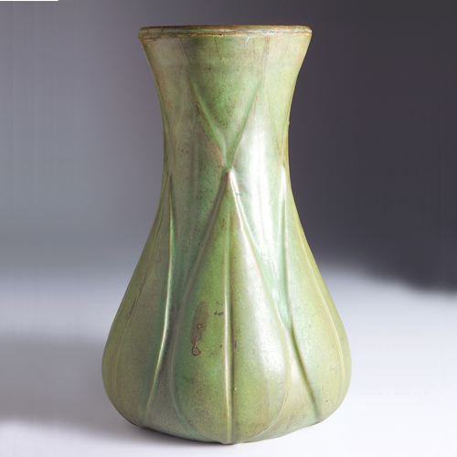 Appraisal: ROSEVILLE Early Velmoss corseted vase embossed with broad leaves Drill