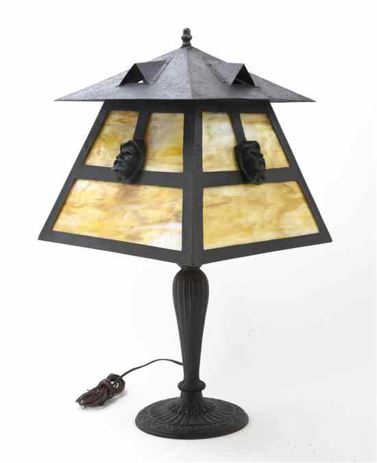 Appraisal: An American Slag Glass Table Lamp the shade having four