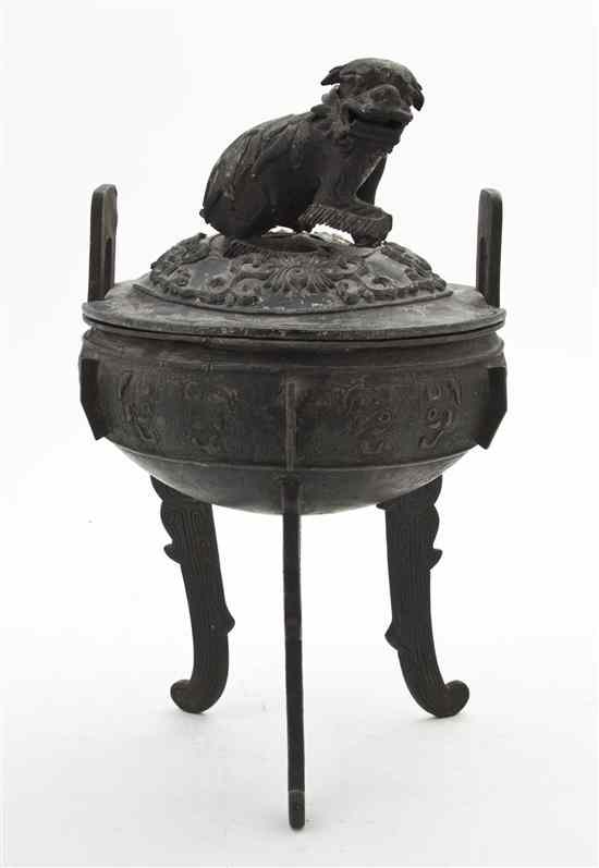 Appraisal: A Chinese Bronze Ding the lidded vessel with a fu