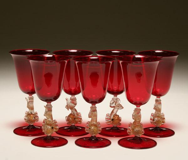 Appraisal: Murano glass dolphin stemware with red basin and foot pc