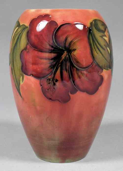 Appraisal: A Moorcroft pottery flambe bulbous shaped vase tube lined and