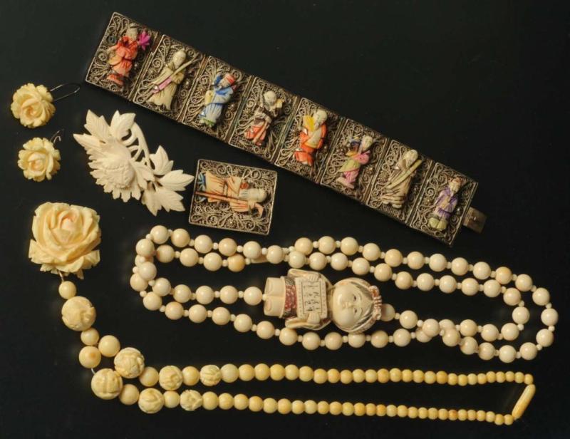 Appraisal: Lot of Ivory Jewelry Pieces Description Includes one pair of