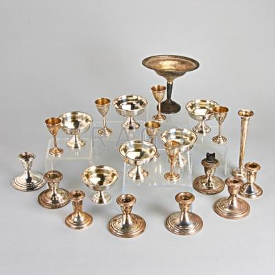 Appraisal: TWENTY-TWO PIECES WEIGHTED SILVER Nine candle stands some by Gorham