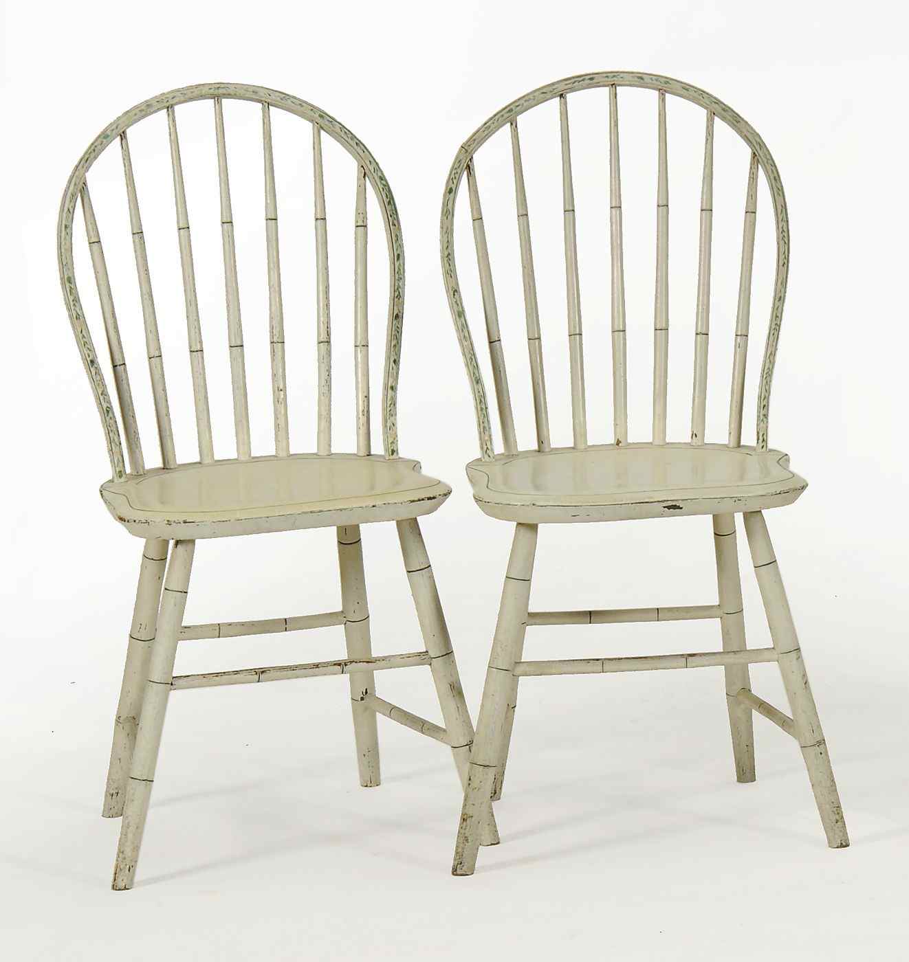 Appraisal: PAIR OF ANTIQUE AMERICAN BOWBACK WINDSOR CHAIRSCirca In old milk