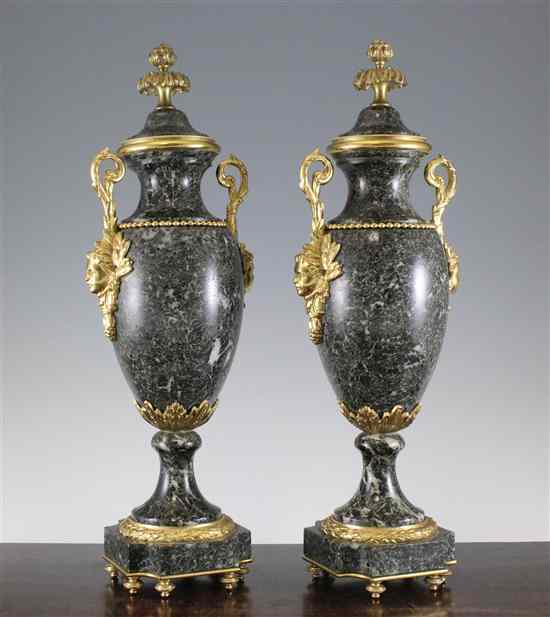 Appraisal: A pair of th century ormolu mounted green marble vase