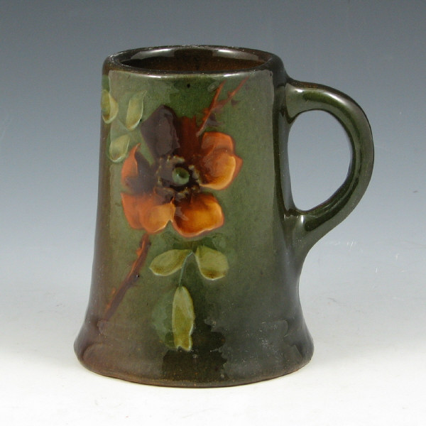 Appraisal: Standard glaze mug with floral decoration Unmarked Excellent condition tall