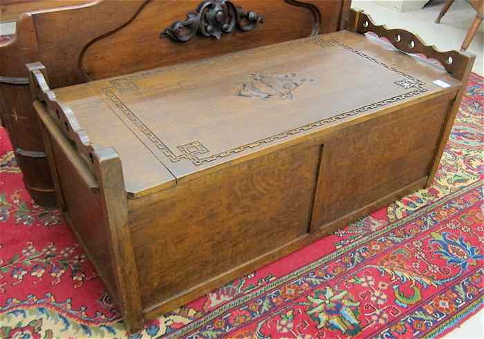 Appraisal: CARVED OAK LIFT-TOP BLANKET CHEST American early th century of