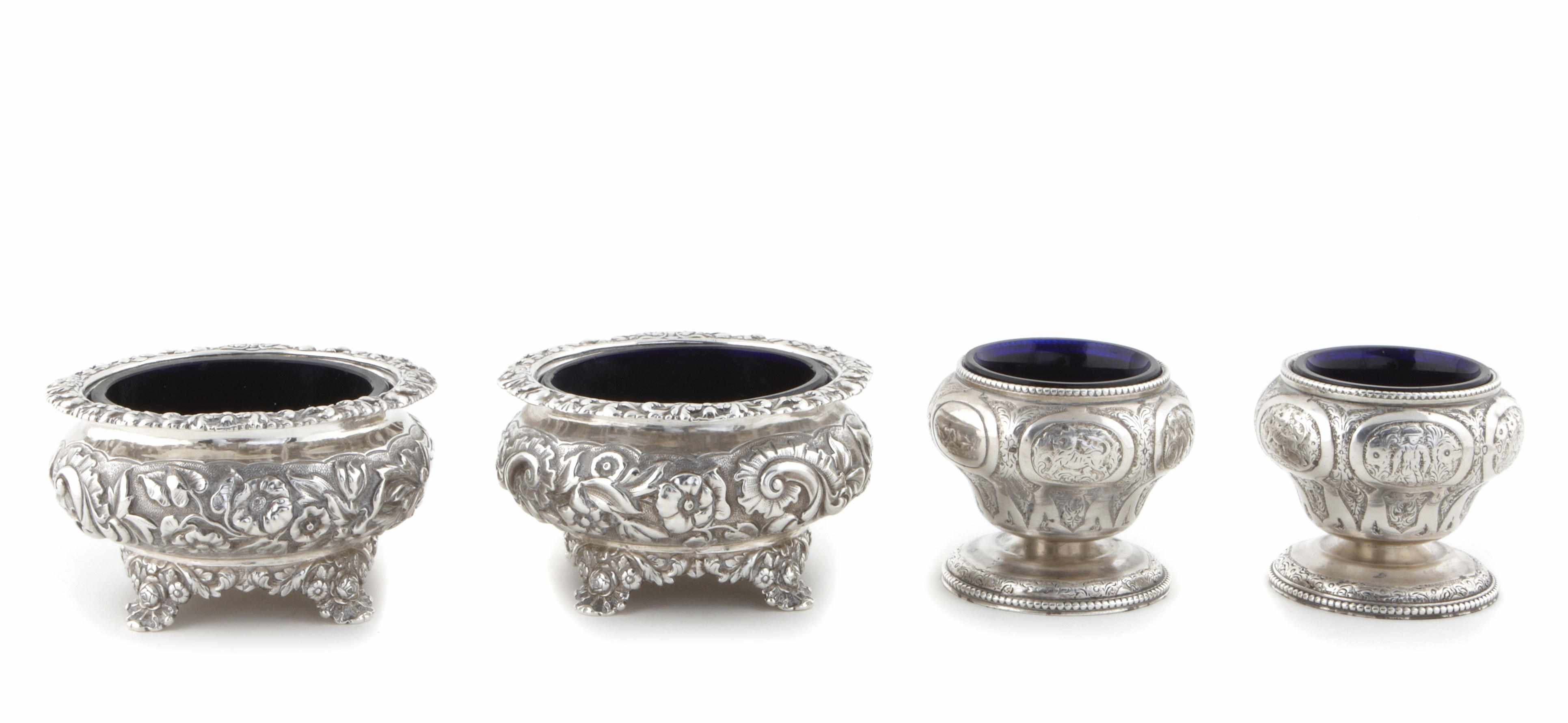 Appraisal: A pair of George IV sterling silver floral chased salt