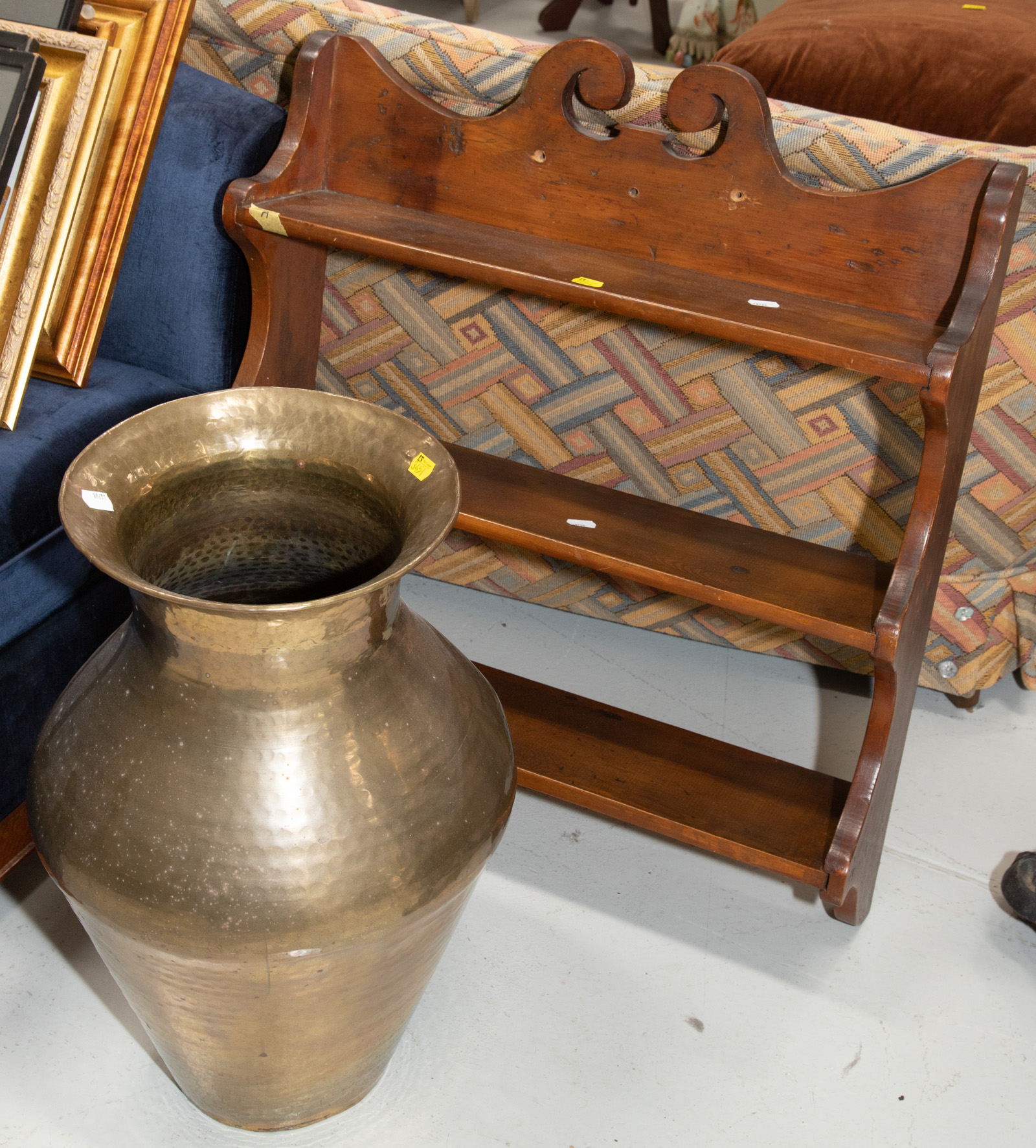 Appraisal: PINE WALL HANGING DISPLAY RACK LARGE BRASS URN Pine wall