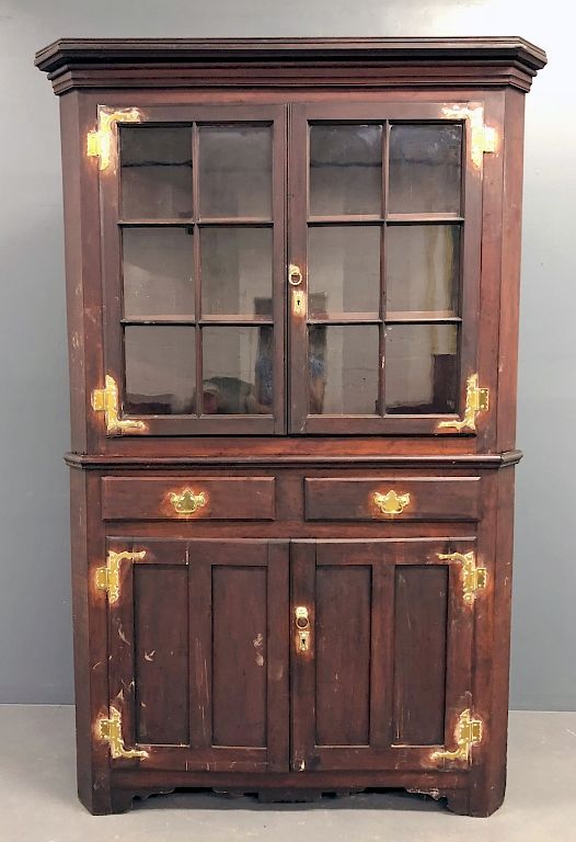 Appraisal: Cherry Two-Piece Corner Cupboard Cherry two-piece corner cupboard circa h