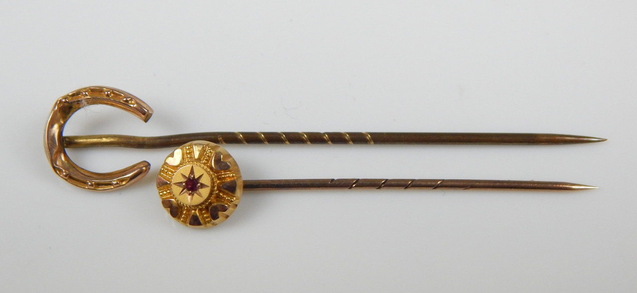 Appraisal: Two stick pins a horseshoe pin and a stone set