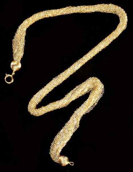 Appraisal: Gold Multi-Strand Mesh Necklacecomposed of fine mesh chains with bead