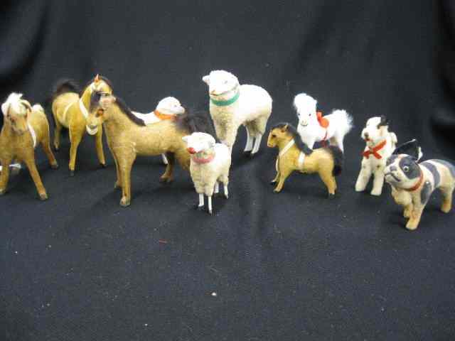 Appraisal: Miniature Animal Figurines mostly flocked some wooden generally ''