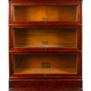 Appraisal: A Mahogany and Glass Barrister Bookcase Early th Century Height