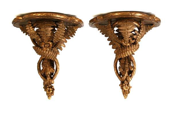 Appraisal: A pair of Neoclassical style giltwood wall brackets height in