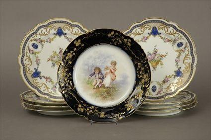 Appraisal: Set of Eight S vres-Style Gilt and Polychrome Decorated Porcelain