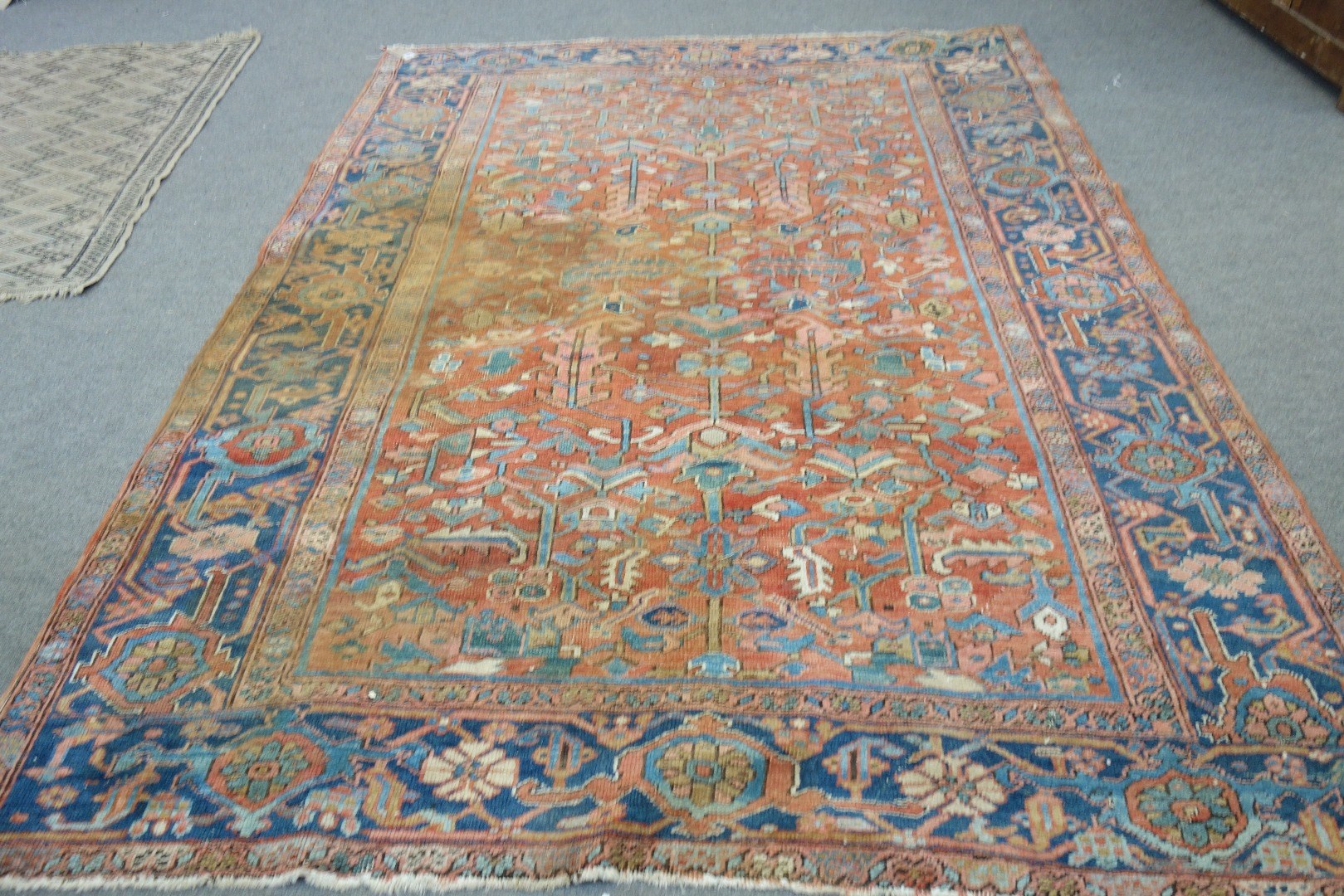 Appraisal: An Heriz carpet Persian the madder field with an allover