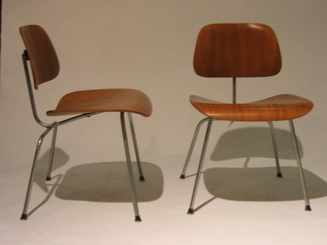 Appraisal: CHARLES AND RAY EAMES FOR HERMAN MILLER Pair walnut DCM