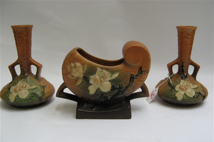 Appraisal: AMERICAN ROSEVILLE ART POTTERY CONSOLE SET three pieces in the