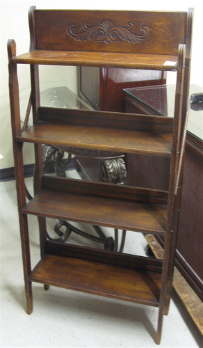 Appraisal: ANTIQUE FOLDING OAK BOOKCASE American late th century having four