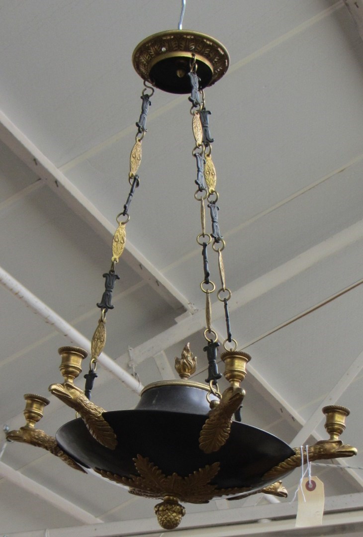 Appraisal: A French gilt bronze and lacquered brass chandelier of Empire