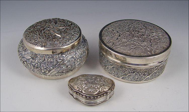 Appraisal: COLLECTION OF SILVER REPOUSSE BOXES To include Turkish silver with