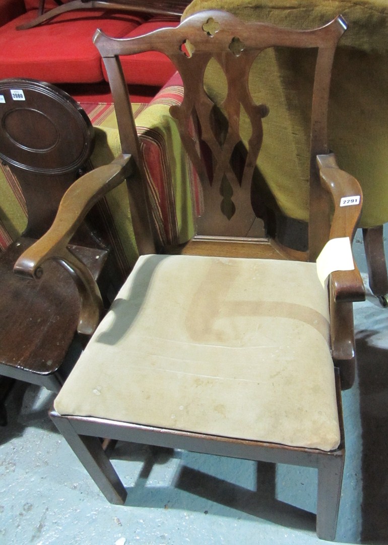 Appraisal: A th century mahogany framed button back armchair and a