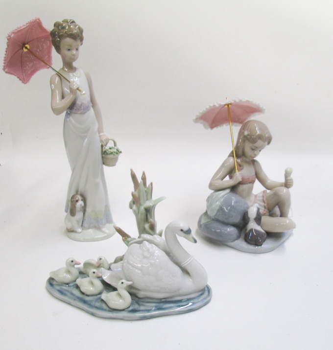 Appraisal: THREE LLADRO PORCELAIN FIGURINES Monday's Child by sculptor Juan Huerta