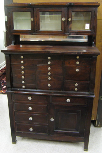 Appraisal: MAHOGANY DENTAL CABINET American c The chest features a variety