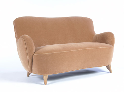 Appraisal: VLADIMIR KAGAN Barrel settee upholstered in tan velvet x x