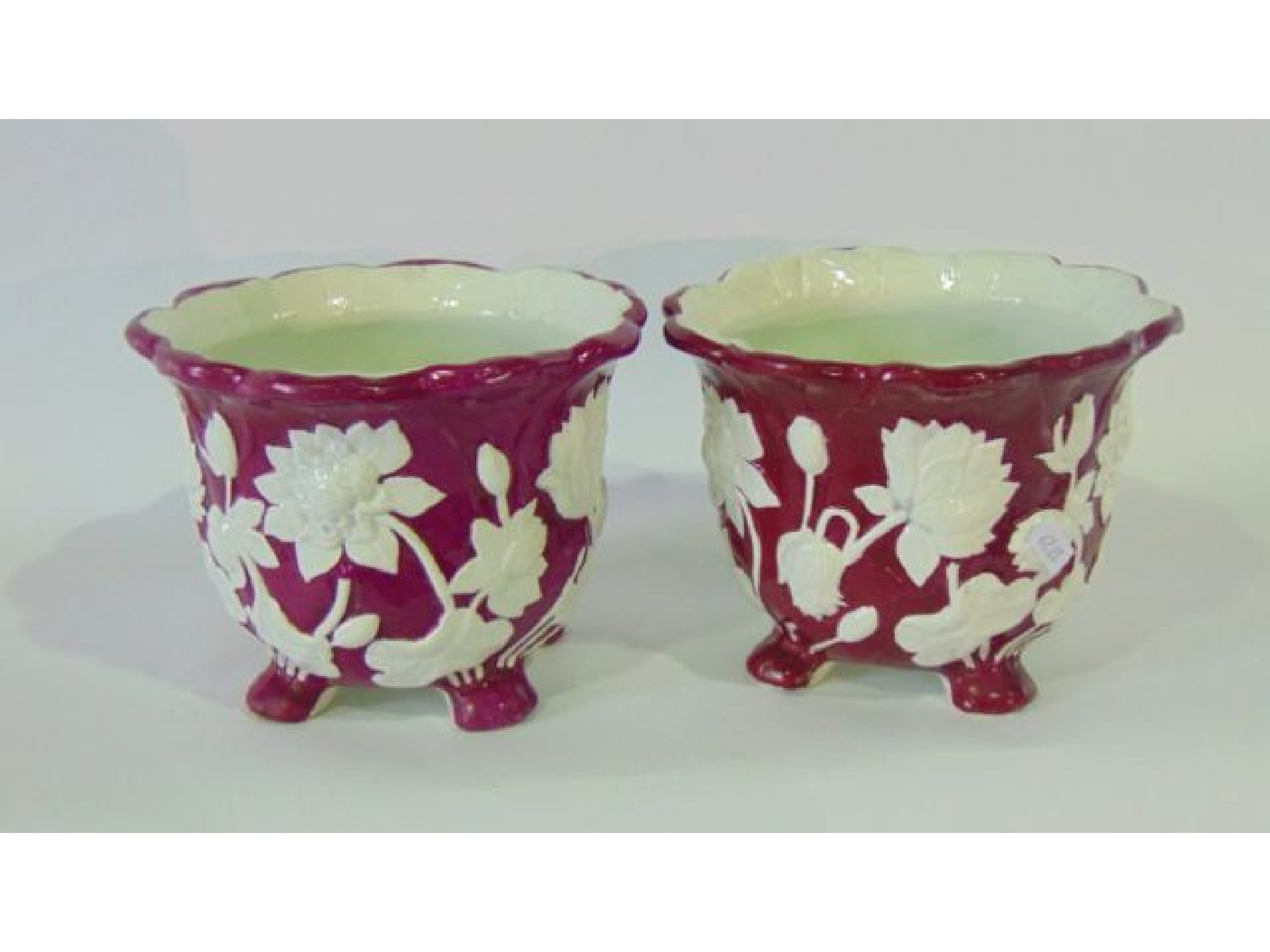 Appraisal: A pair of th century Minton jardini res with moulded