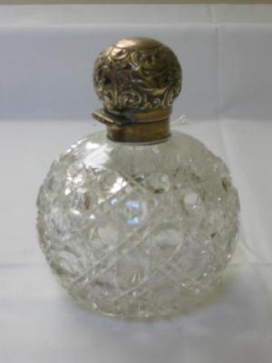 Appraisal: A LATE VICTORIAN CLEAR GLASS SCENT BOTTLE of spherical form