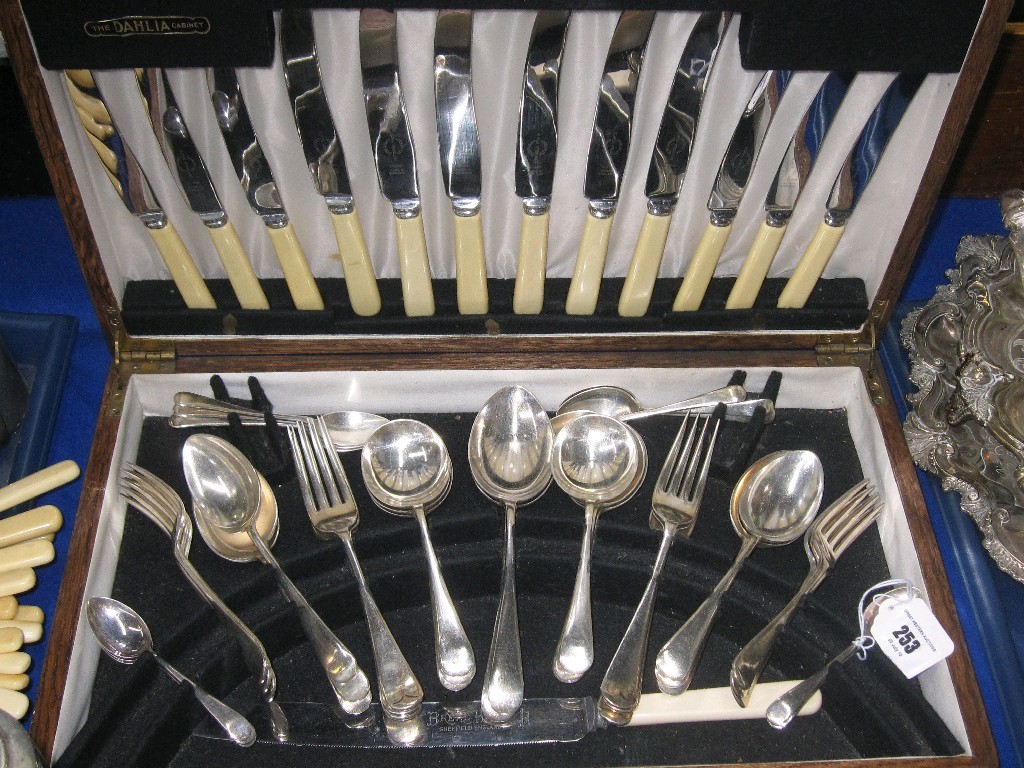 Appraisal: Fifty piece cutlery set in oak canteen