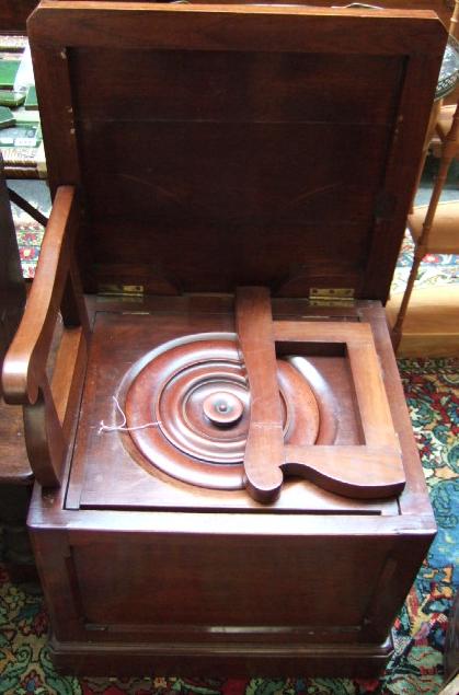 Appraisal: A th century mahogany box commode of canted square form