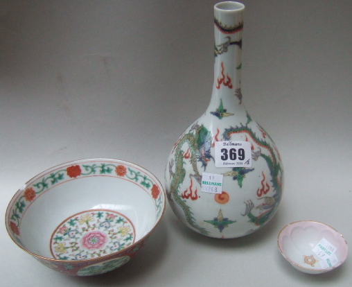 Appraisal: A 'famille-verte' bottle vase painted with dragons chasing flaming pearls