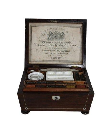 Appraisal: A Regency rosewood and mother-of-pearl inlaid paint box of sarcophagus