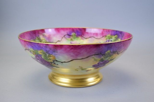 Appraisal: Limoges Hand Painted Footed Punch Bowl Artist signed hand painted