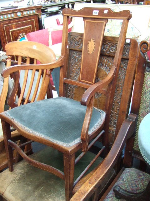 Appraisal: An Edwardian inlaid mahogany open armchair the serpentine seat raised