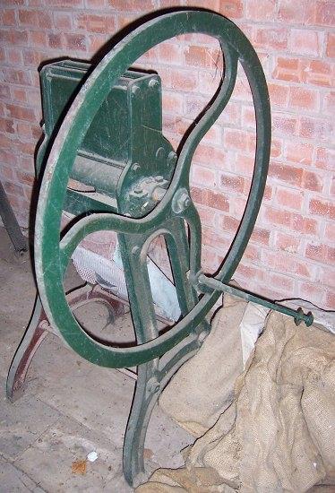 Appraisal: A hand operated mulching machine by S A S H