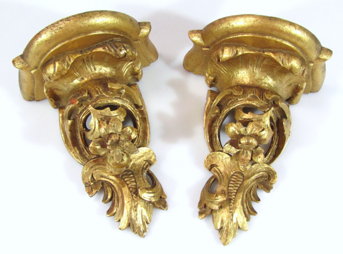 Appraisal: A pair of thC gilt wood wall sconces each with