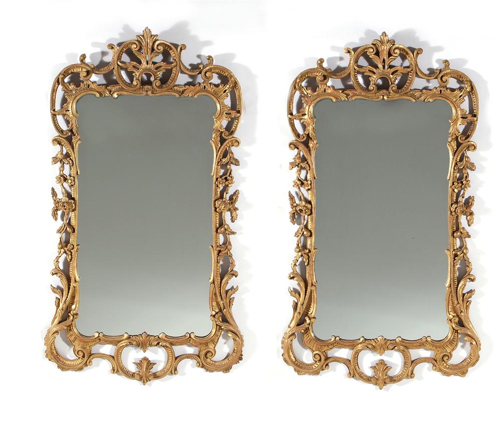 Appraisal: Pair Continental carved giltwood framed mirrors probably Italian H W