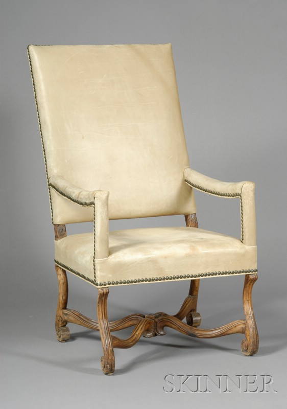 Appraisal: Continental Baroque-style Leather Upholstered Great Chair composed of antique elements