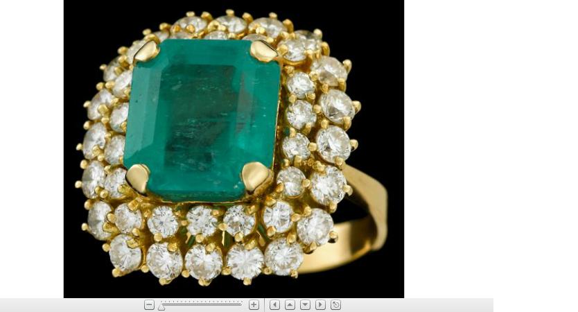 Appraisal: karat yellow gold emerald and diamond dinner ringStep cut emerald