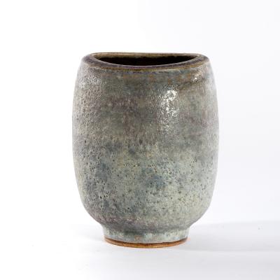 Appraisal: Chris Carter British born a pale blue glaze stoneware vase