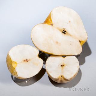 Appraisal: Three Sliced Stone Apples th century three apple halves painted